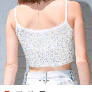Brandy Melville Tops - Rare brandy Melville Skylar bow tank Brandy Melville Tops - Rare brandy Melville Skylar bow tank